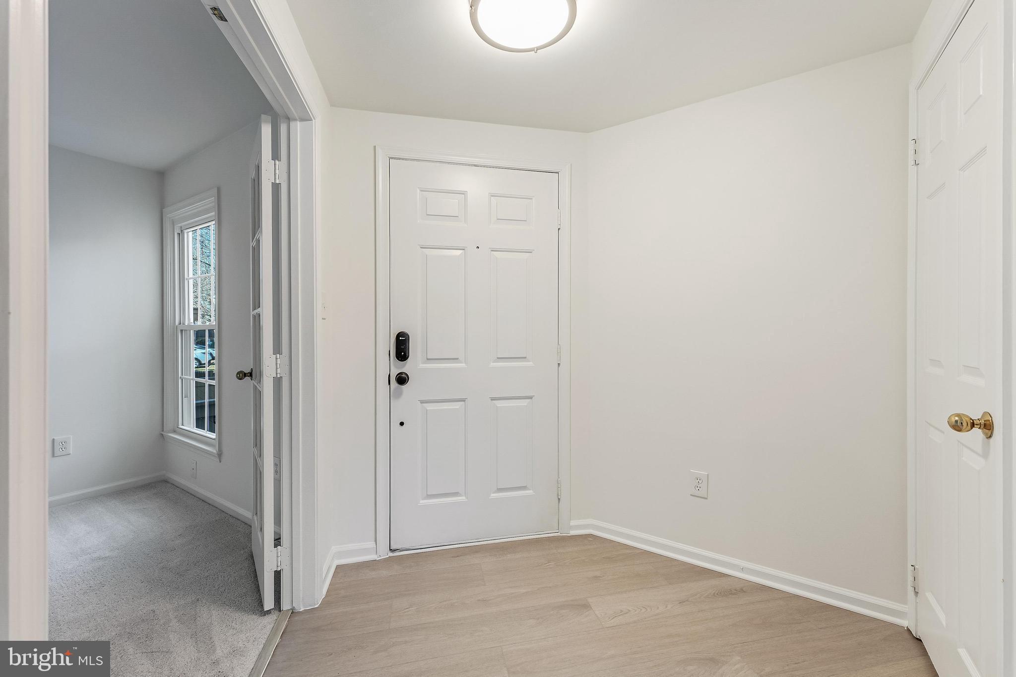 1483 Church Hill Place Reston, VA 20194 - Photo 22 of 38 an empty room with white door