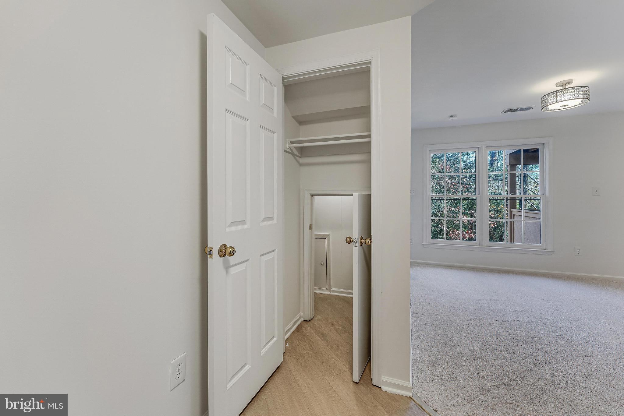 1483 Church Hill Place Reston, VA 20194 - Photo 23 of 38 an empty room with windows and closet