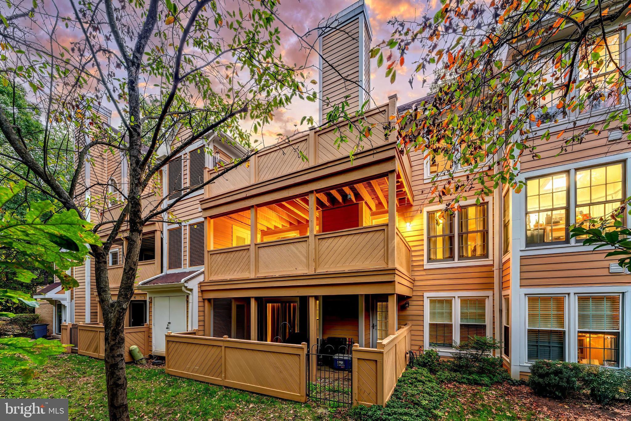 1483 Church Hill Place Reston, VA 20194 - Photo 28 of 38 a tall building with large windows