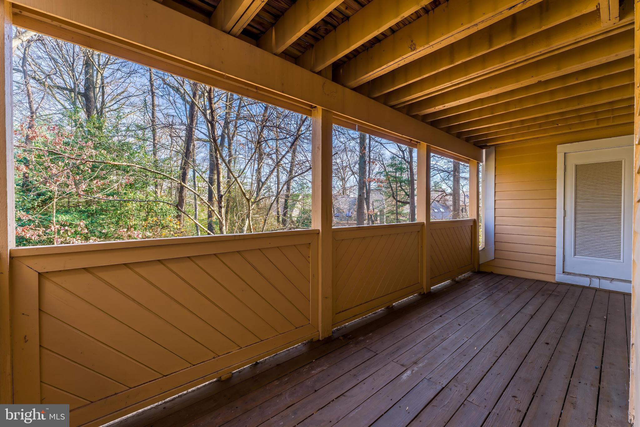 1483 Church Hill Place Reston, VA 20194 - Photo 31 of 38 a view of an empty room with wooden floor and a window