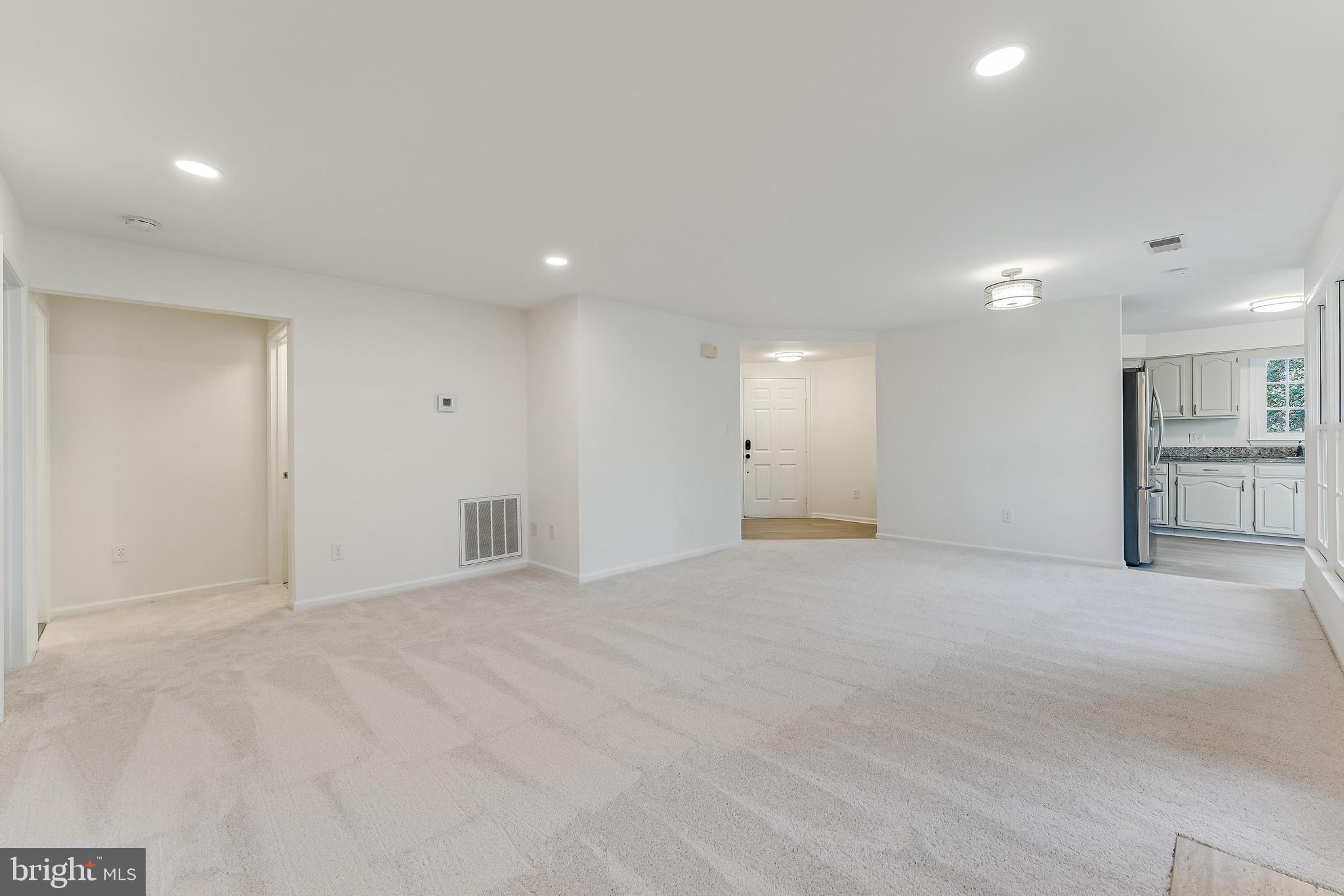 1483 Church Hill Place Reston, VA 20194 - Photo 10 of 38 a view of an empty room with wooden cabinet