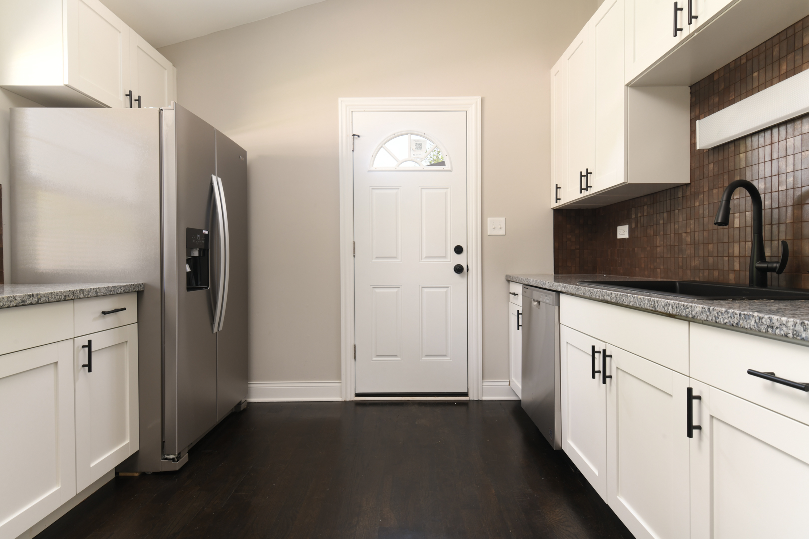 3402 Roesner Drive Markham, IL 60428 - Photo 6 of 23 a view of a refrigerator in kitchen and a sink