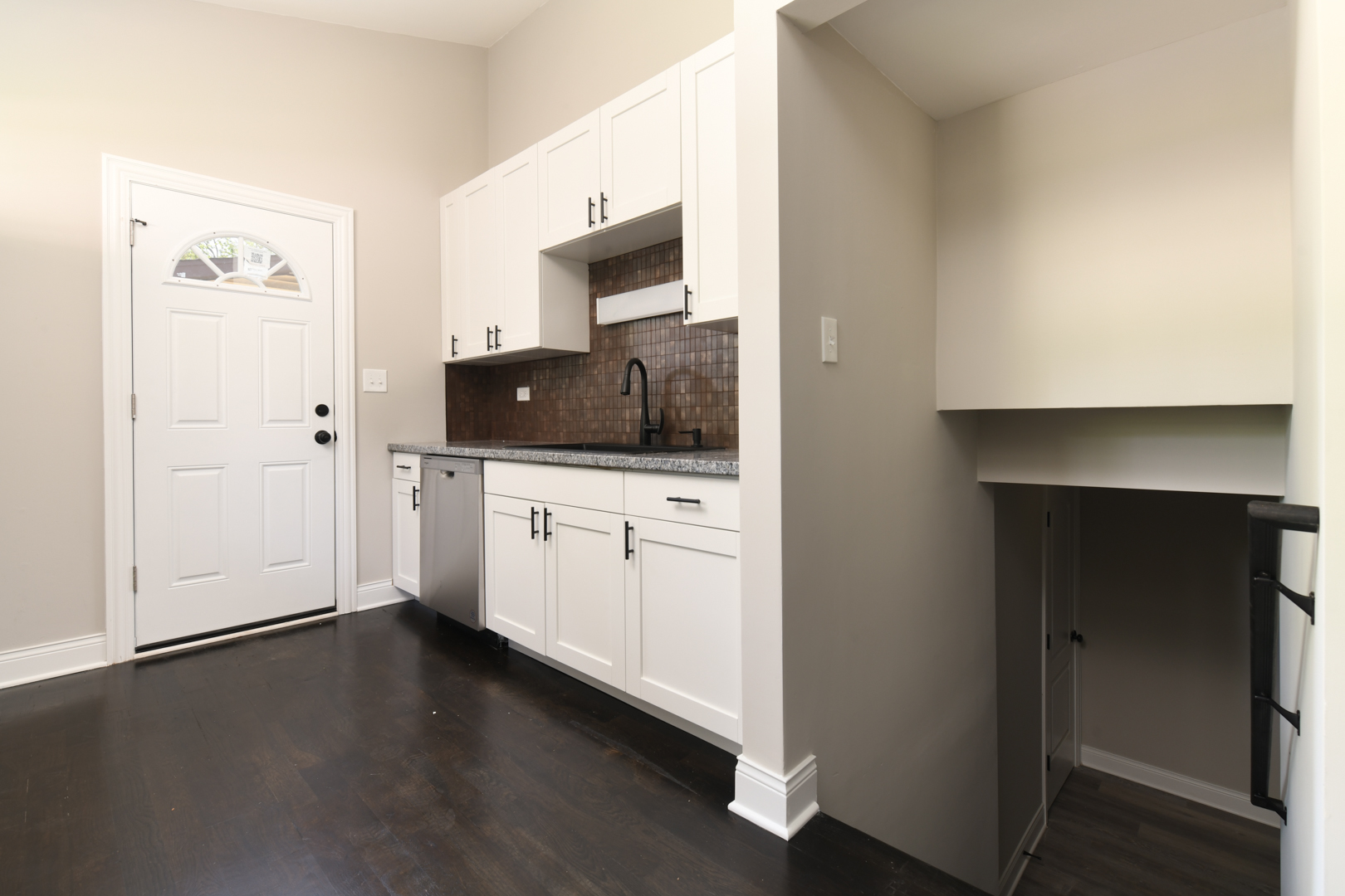 3402 Roesner Drive Markham, IL 60428 - Photo 7 of 23 a kitchen with white cabinets and sink