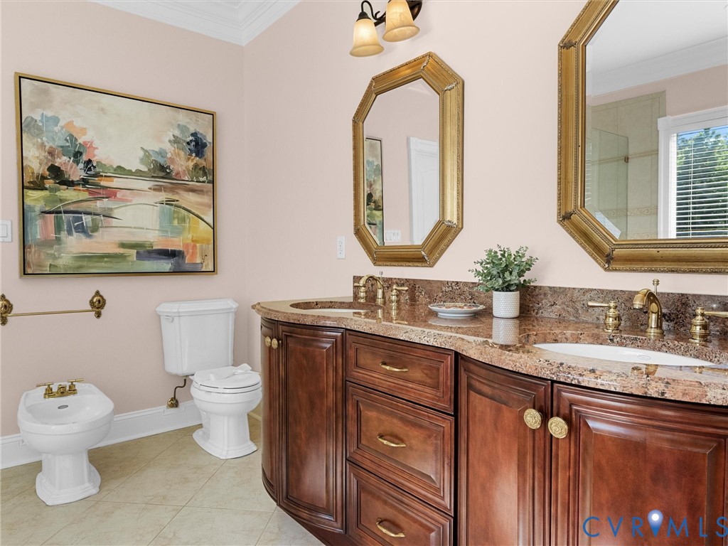 13612 Waterswatch Court Midlothian, VA 23113 - Photo 60 of 88 a bathroom with double vanity sinks a toilet and a large mirror