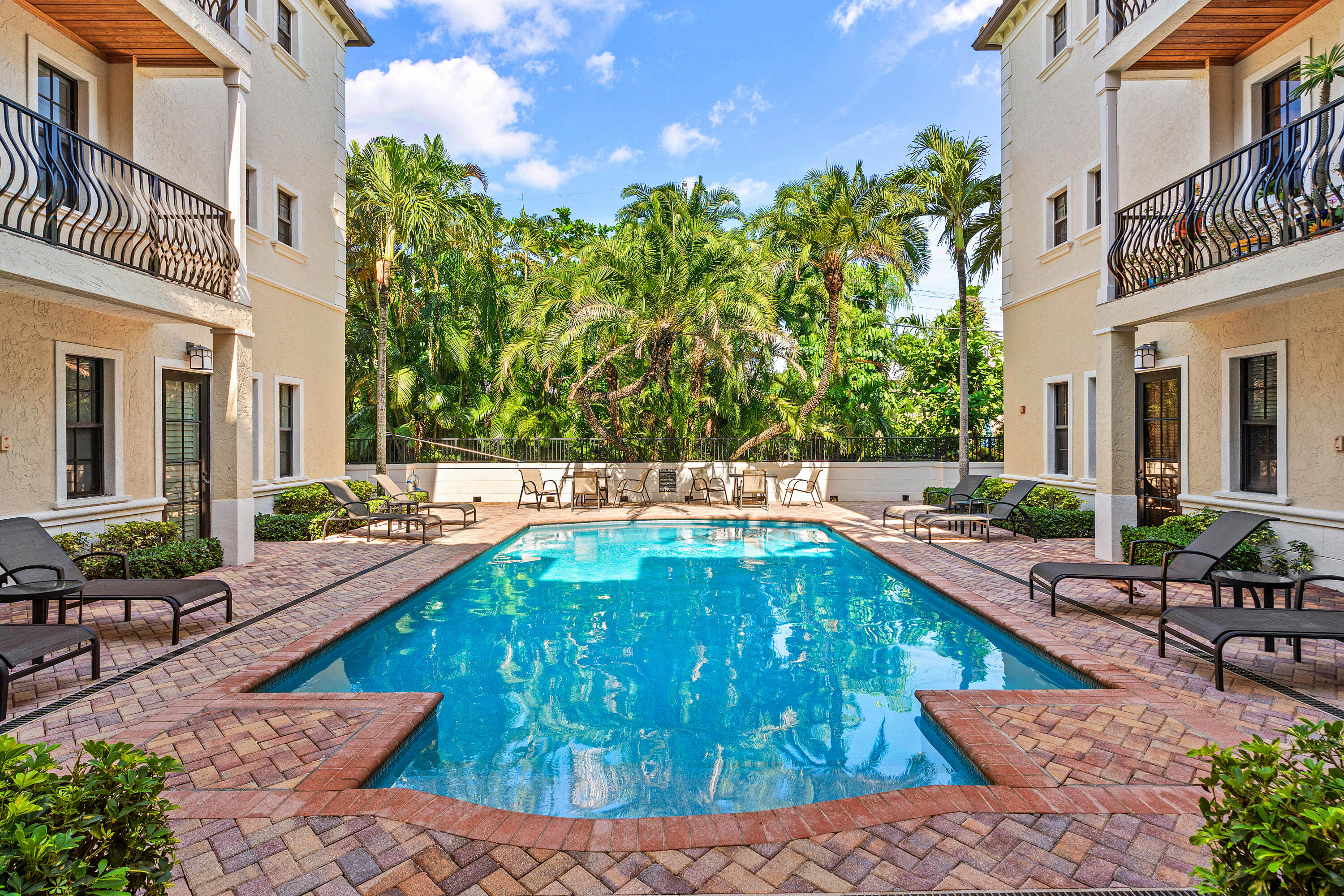 110 Gleason Street, Unit 203 Delray Beach, FL 33483 - Photo 23 of 25 a view of swimming pool with outdoor seating