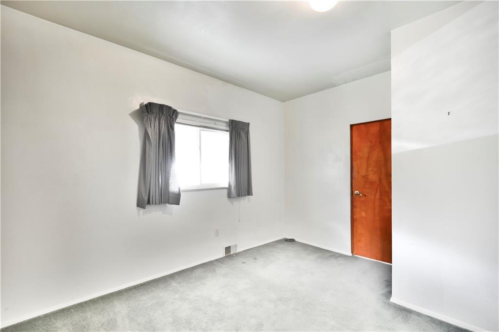 234 Hickory Street McKees Rocks, PA 15136 - Photo 8 of 12 an empty room with windows