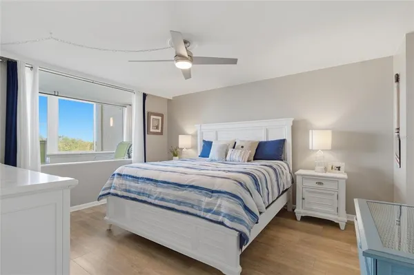 a view of a swimming pool with a lounge chairs