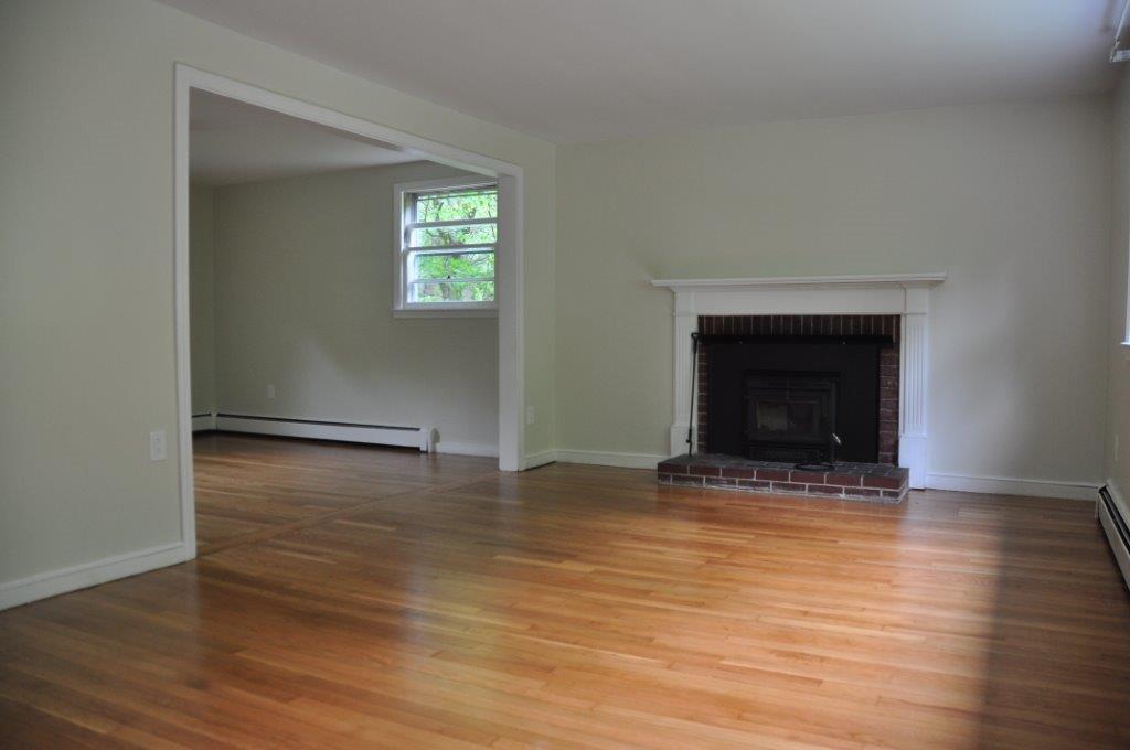 25 Carriage Road Cumberland Foreside, ME 04110 - Photo 4 of 29 Living Room with wood burning...