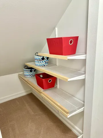 a bathroom with a sink toilet a mirror and shower
