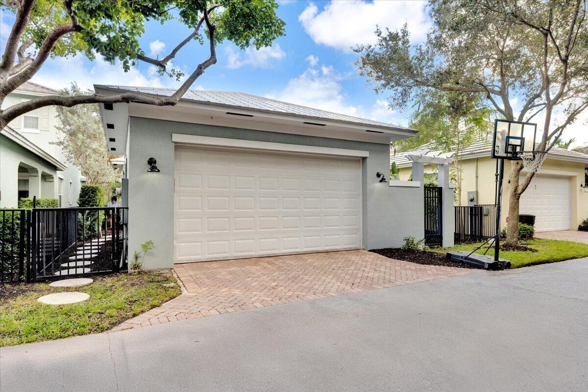 120 West Bay Cedar Circle Jupiter, FL 33458 - Photo 27 of 33 a view of backyard of house