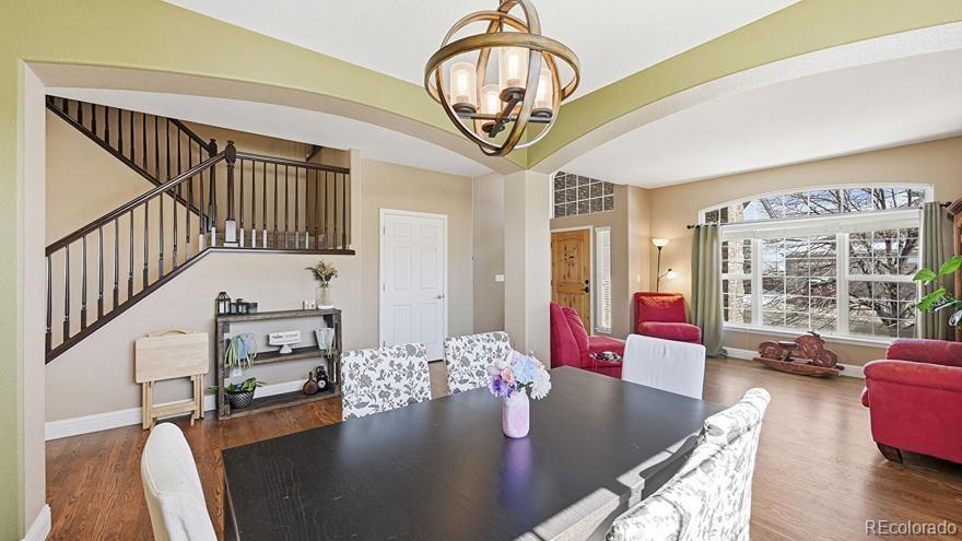 7869 Solstice Way Castle Rock, CO 80108 - Photo 9 of 41 a view of a living room and dining room
