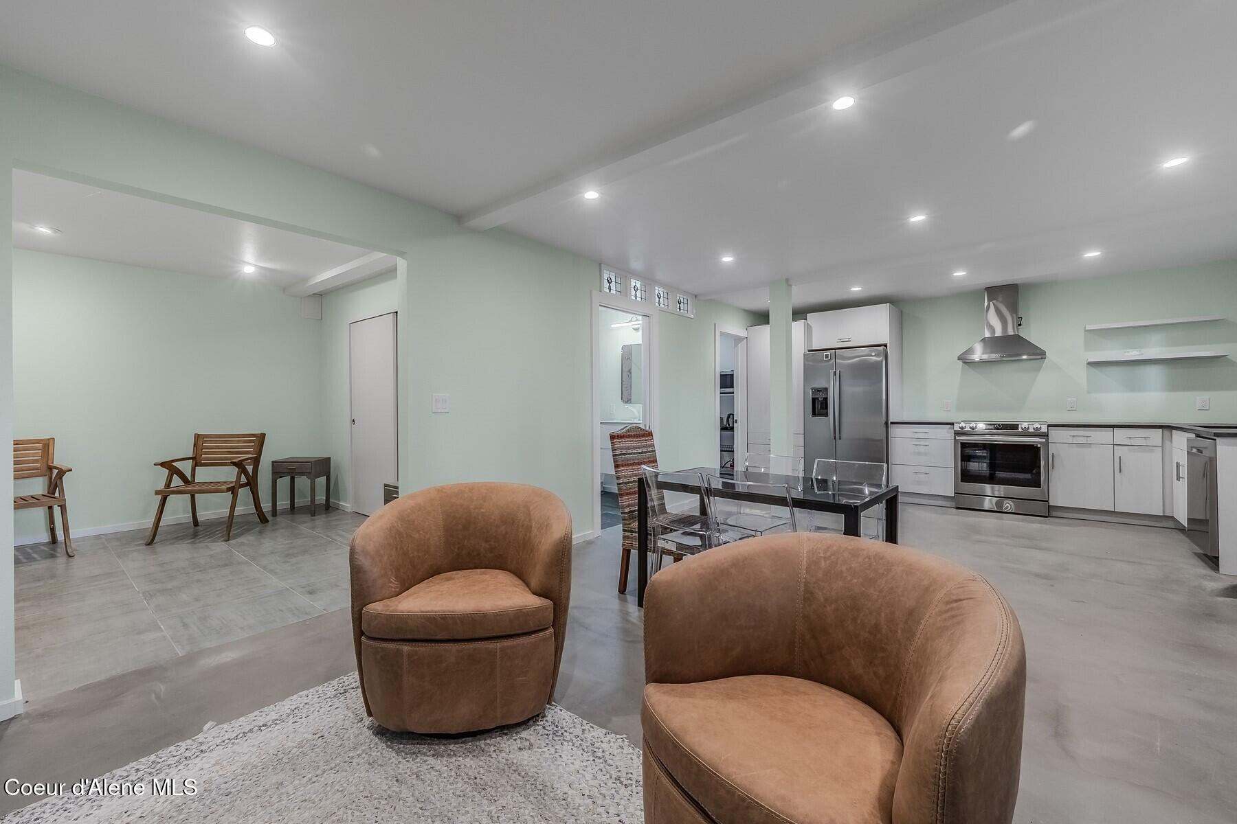 18352 South Crossbill Road Coeur D'Alene, ID 83814 - Photo 23 of 29 Basement Kitchen and Living
