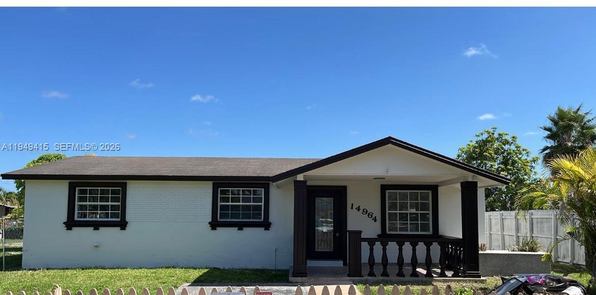 14964 Southwest 305th Terrace Homestead, FL 33033 - Photo 3 of 4 a front view of a house with yard