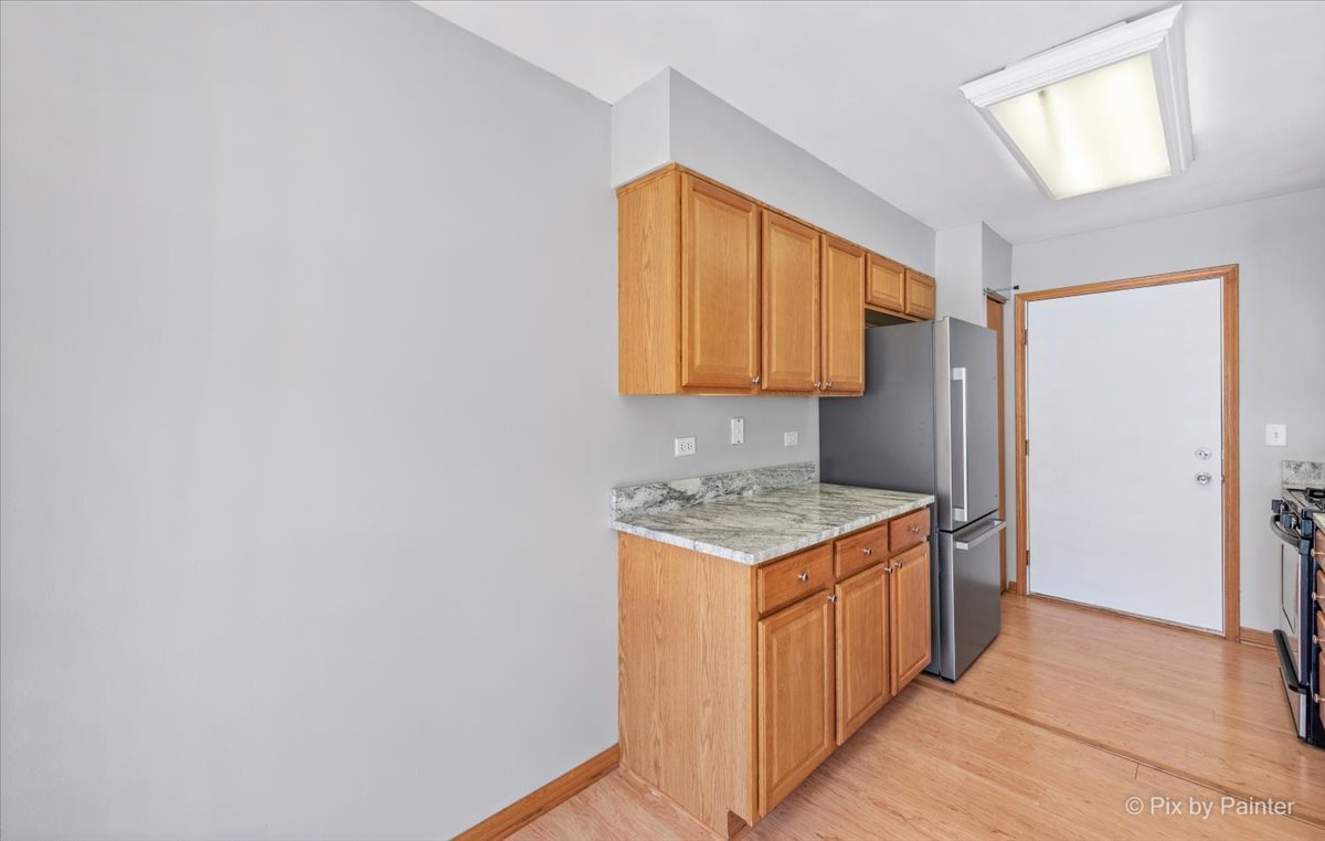 9433 Rainsford Drive, Unit 9433 Huntley, IL 60142 - Photo 11 of 30 a utility room with a sink dryer and washer