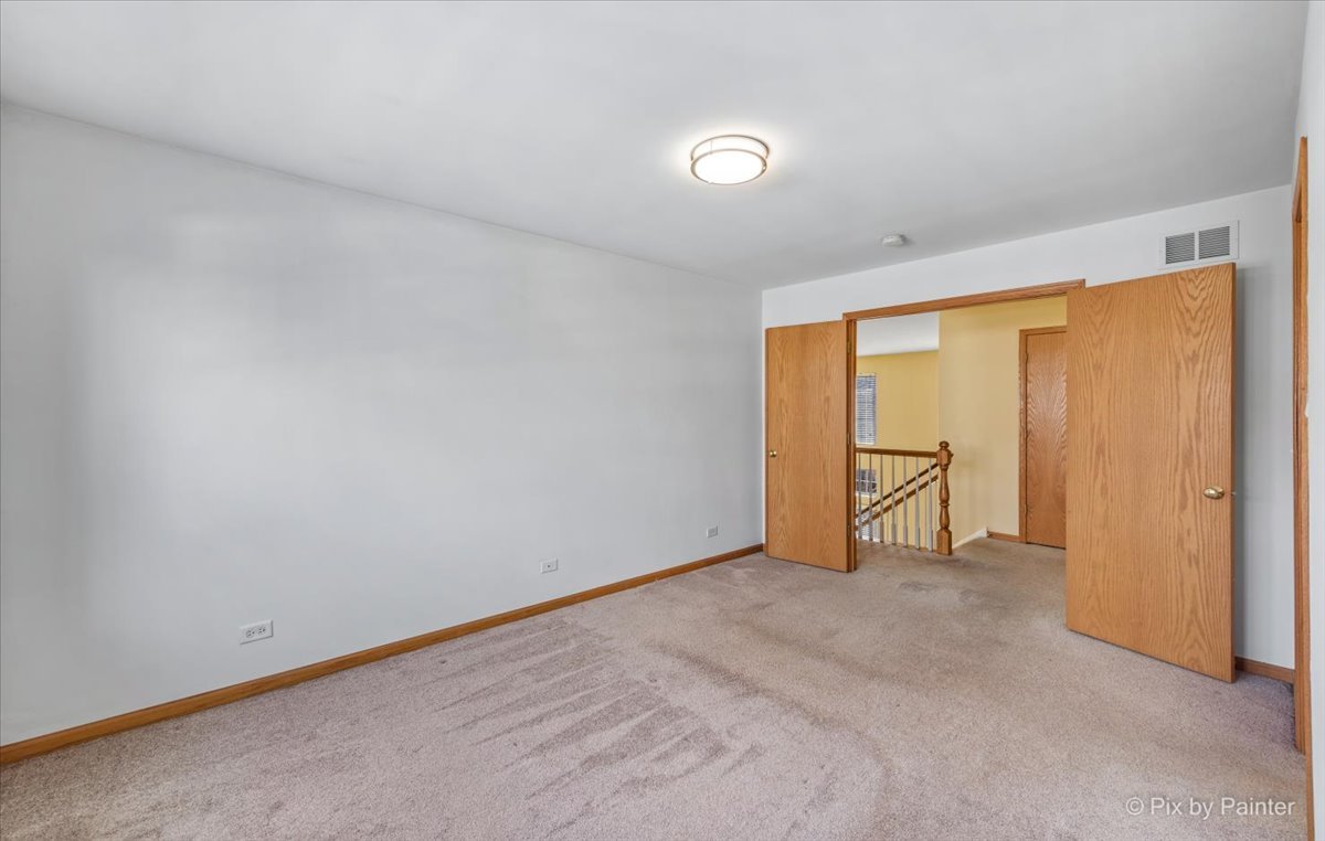 9433 Rainsford Drive, Unit 9433 Huntley, IL 60142 - Photo 17 of 30 a view of an empty room