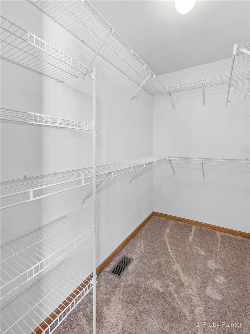 9433 Rainsford Drive, Unit 9433 Huntley, IL 60142 - Photo 19 of 30 a view of an empty walk in closet