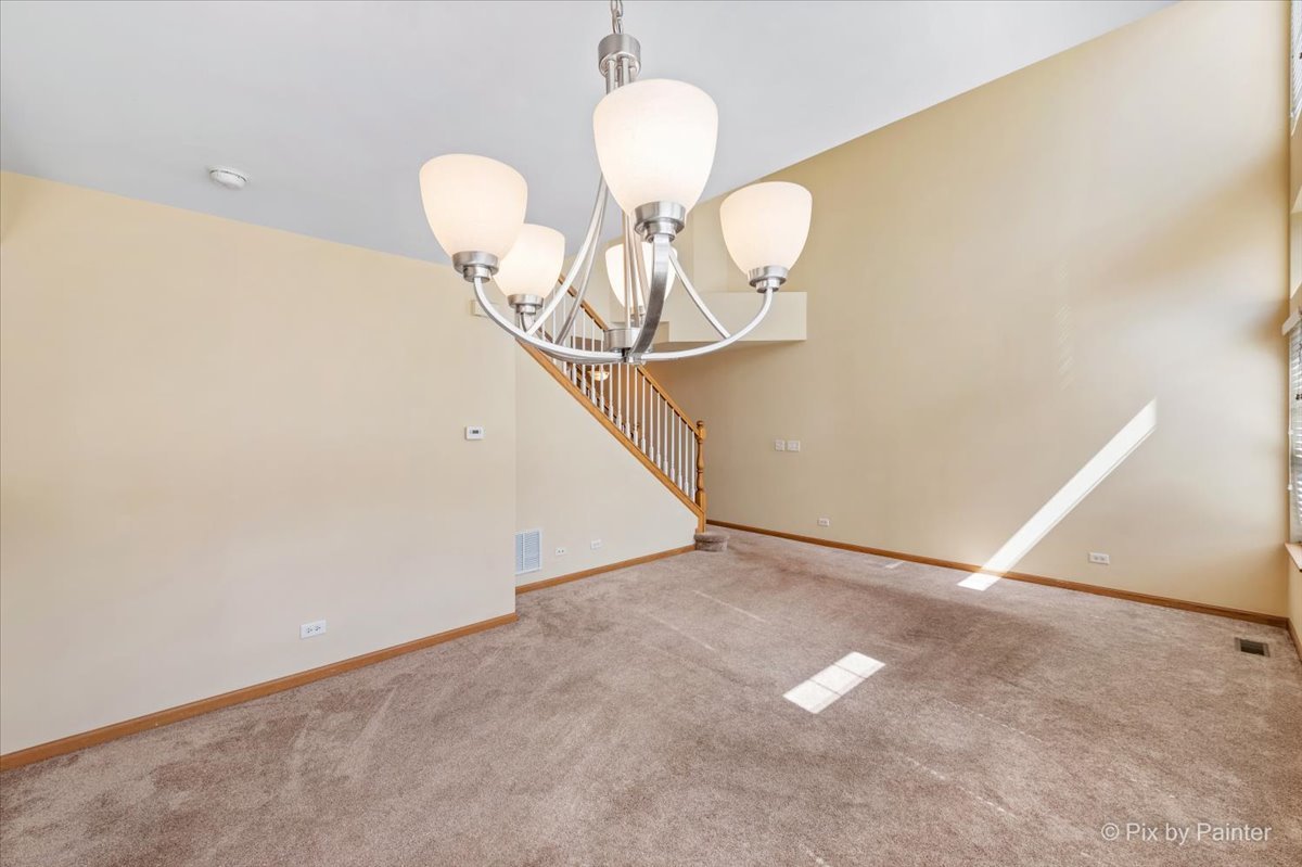 9433 Rainsford Drive, Unit 9433 Huntley, IL 60142 - Photo 9 of 30 a view of wooden floor in hallway
