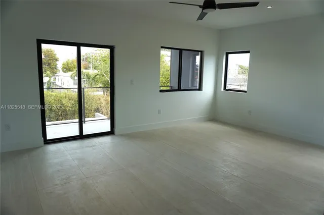 an empty room with windows