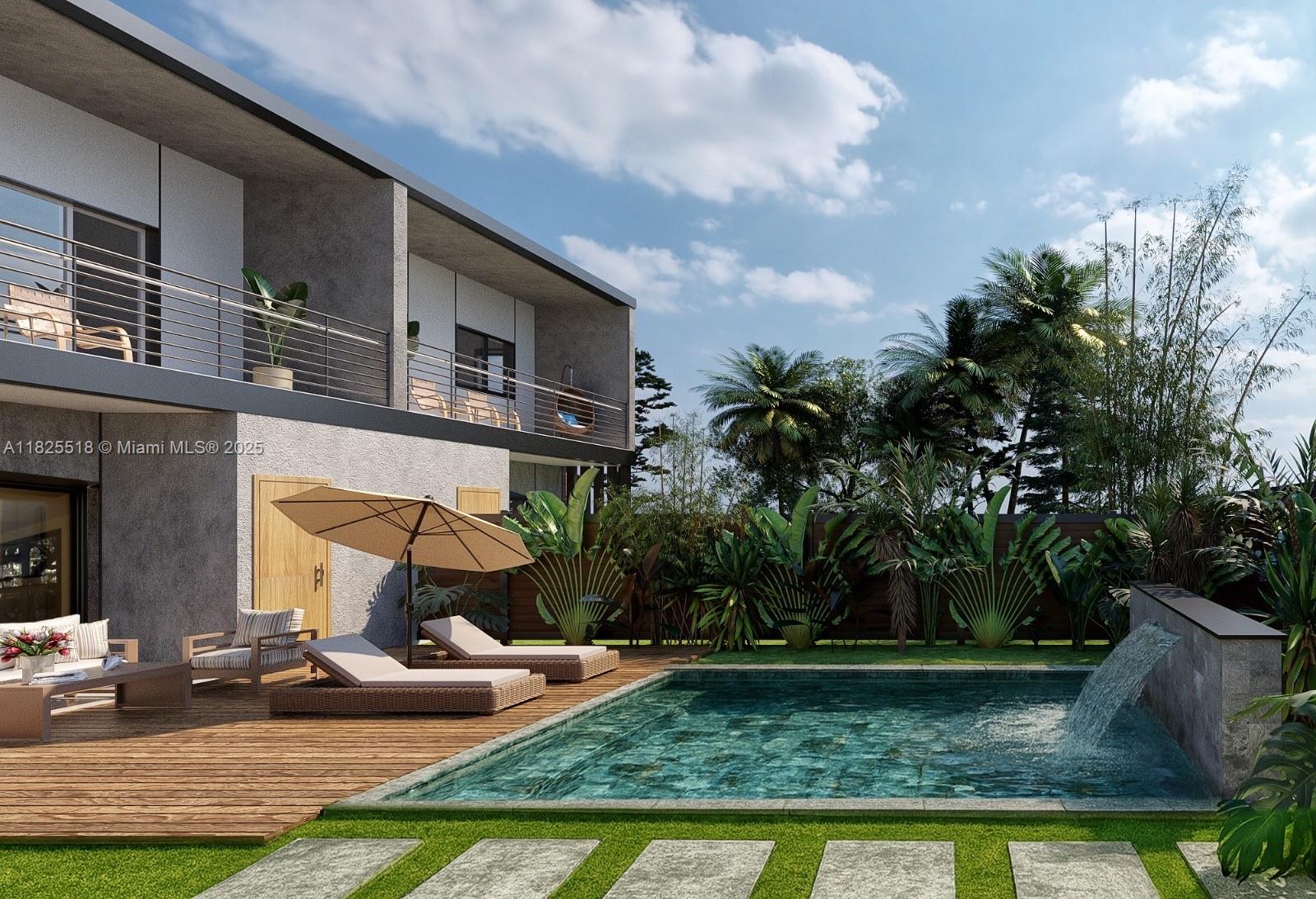 3187 Southwest 23rd Street, Unit A Miami, FL 33145 - Photo 4 of 18 a front view of a house with garden