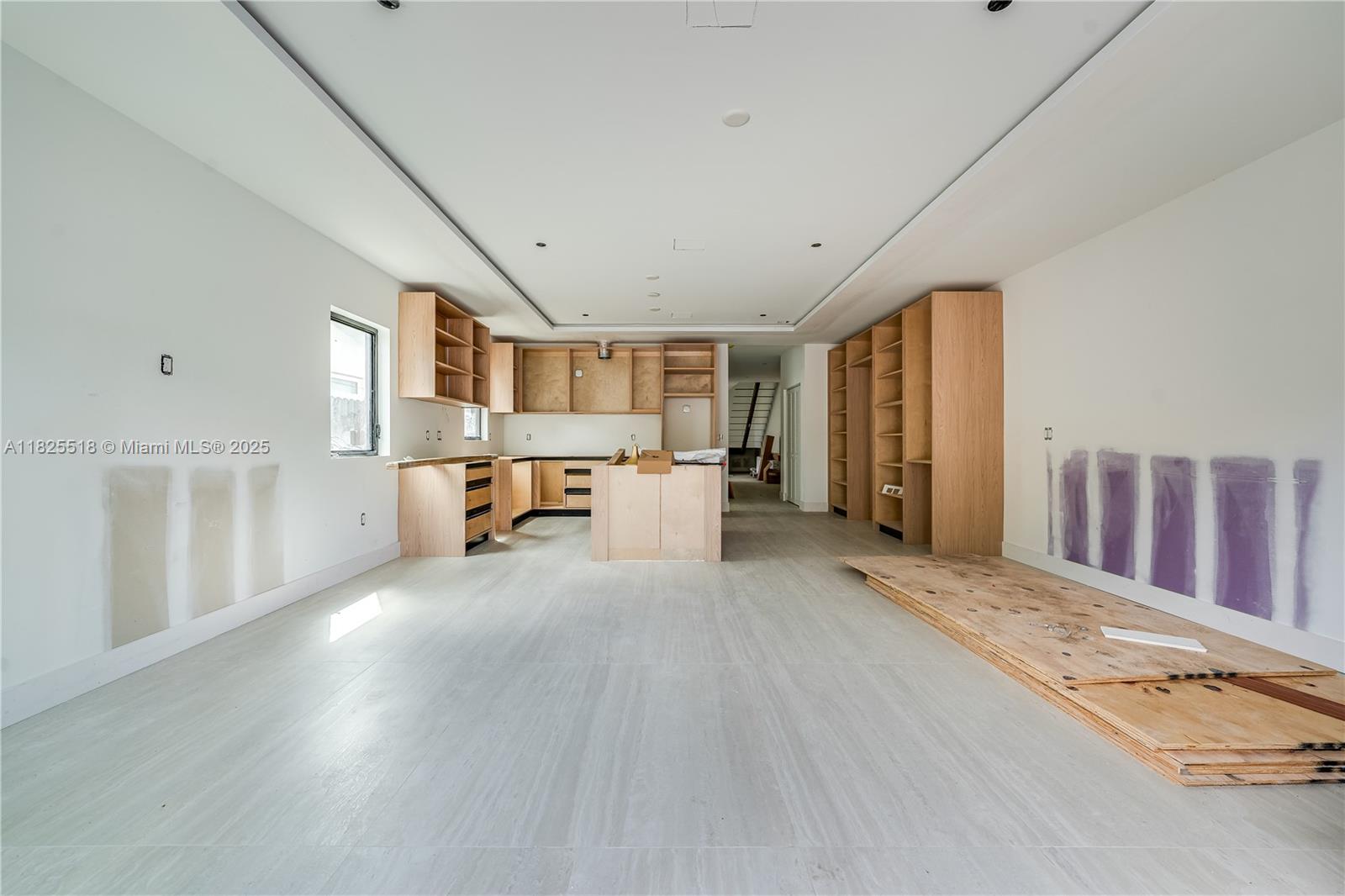 3187 Southwest 23rd Street, Unit A Miami, FL 33145 - Photo 5 of 18 a view of a kitchen with furniture and a window
