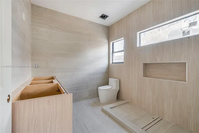 a bathroom with a toilet