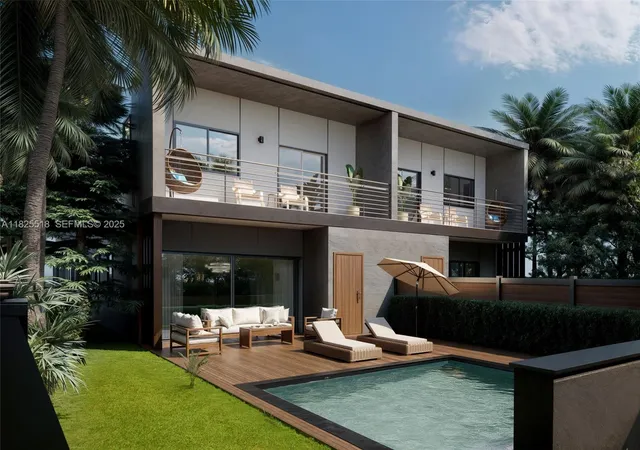 a view of a house with backyard porch and sitting area