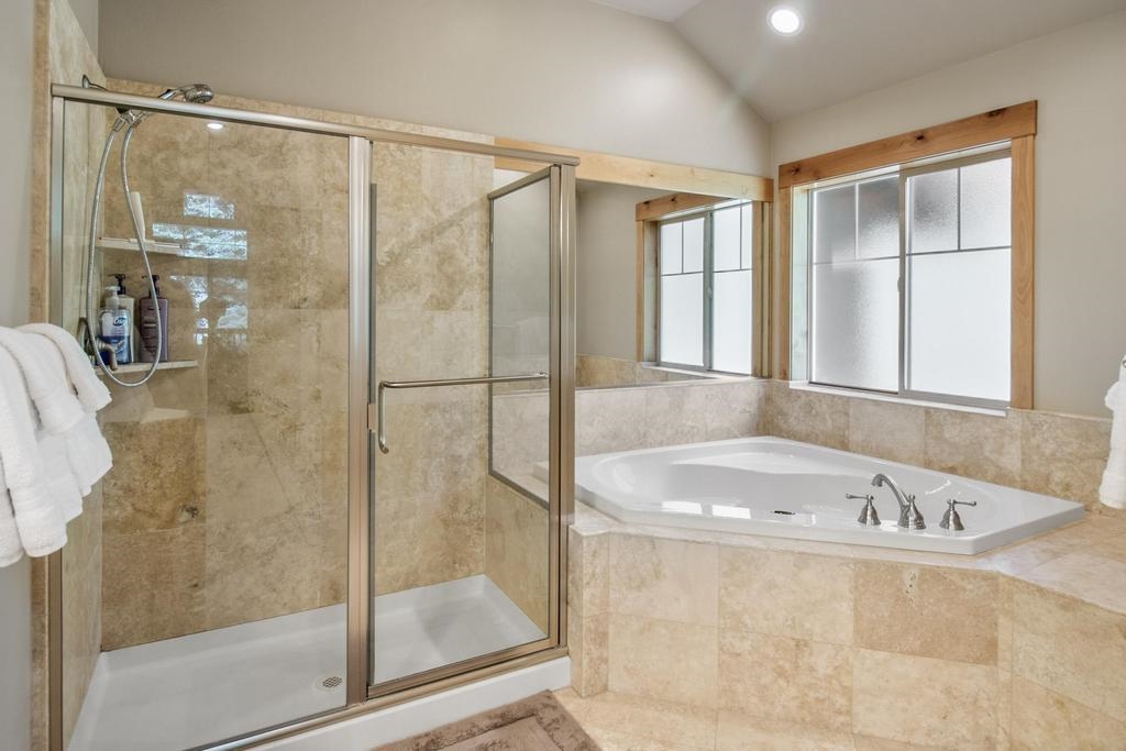 11347 Ski Slope Way Truckee, CA 96161 - Photo 13 of 21 a bathroom with a tub and a shower