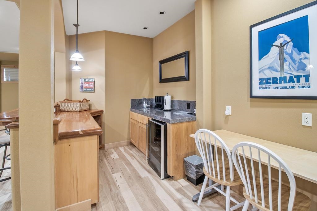 11347 Ski Slope Way Truckee, CA 96161 - Photo 15 of 21 a kitchen with a refrigerator and a stove top oven