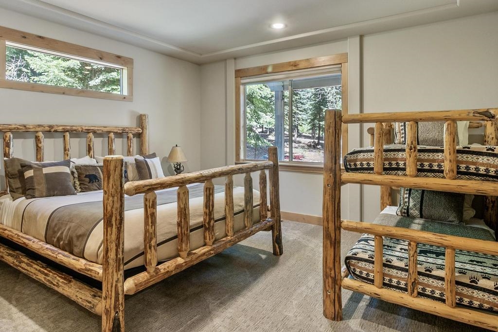 11347 Ski Slope Way Truckee, CA 96161 - Photo 17 of 21 a bed sitting in a bedroom next to a window