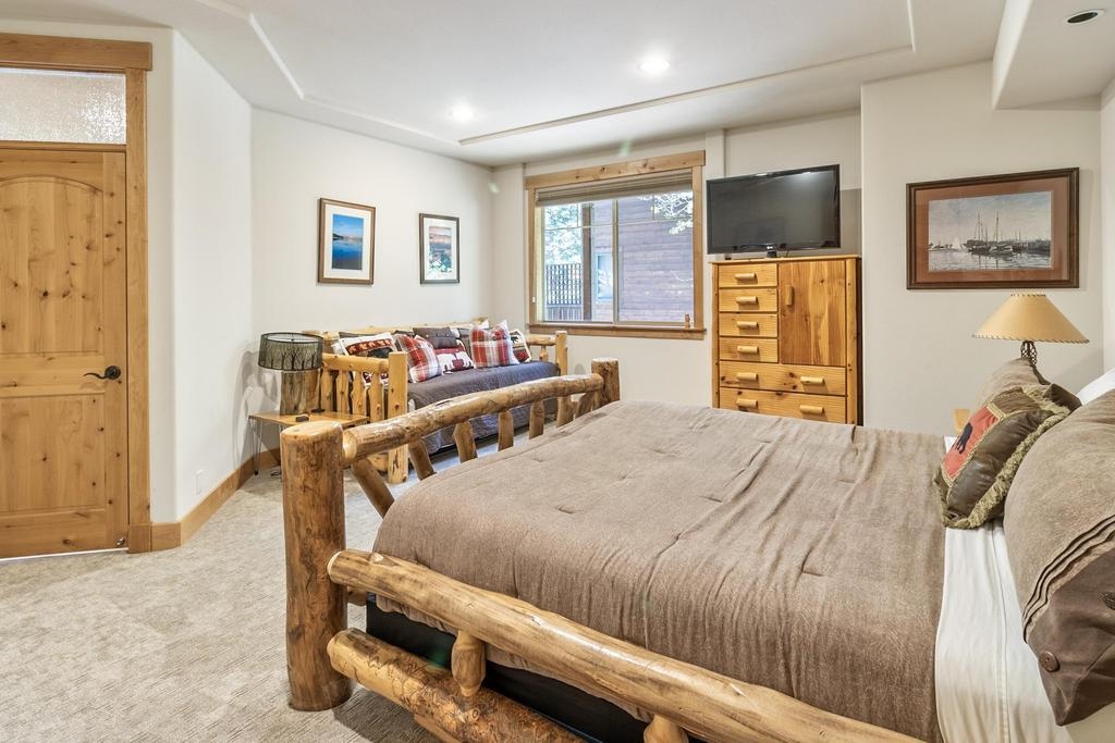 11347 Ski Slope Way Truckee, CA 96161 - Photo 19 of 21 a bedroom with furniture and windows