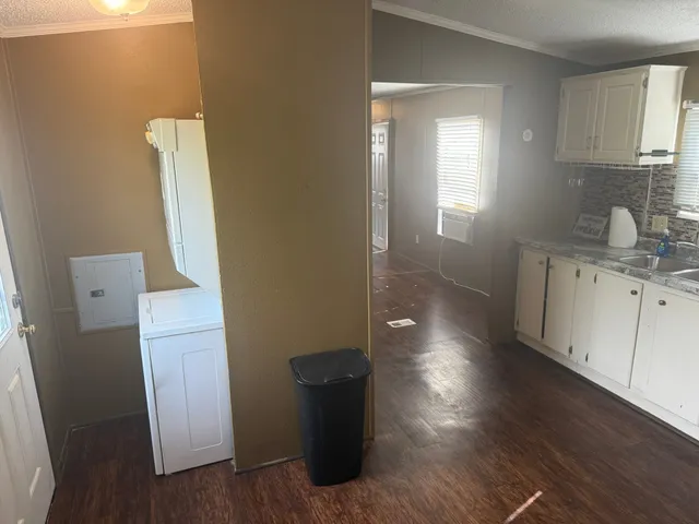wooden floor in an empty room and a window