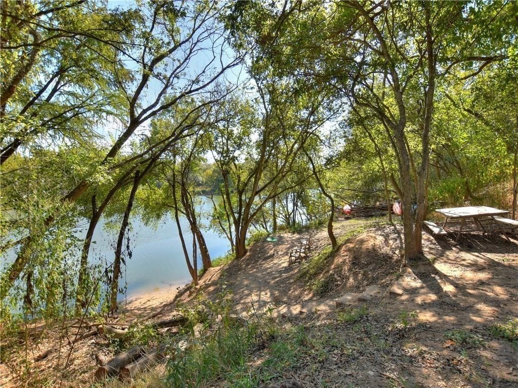 7108 Hester Road Austin, TX 78725 - Photo 23 of 25 a backyard of a house with lots of green space