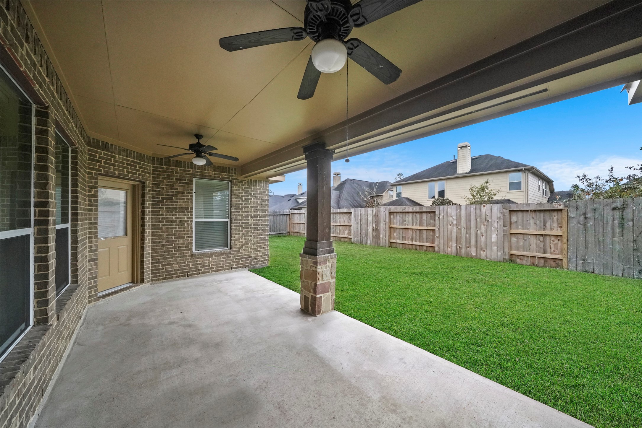 8132 Tranquil Lake Way Conroe, TX 77385 - Photo 19 of 32 Covered back patio