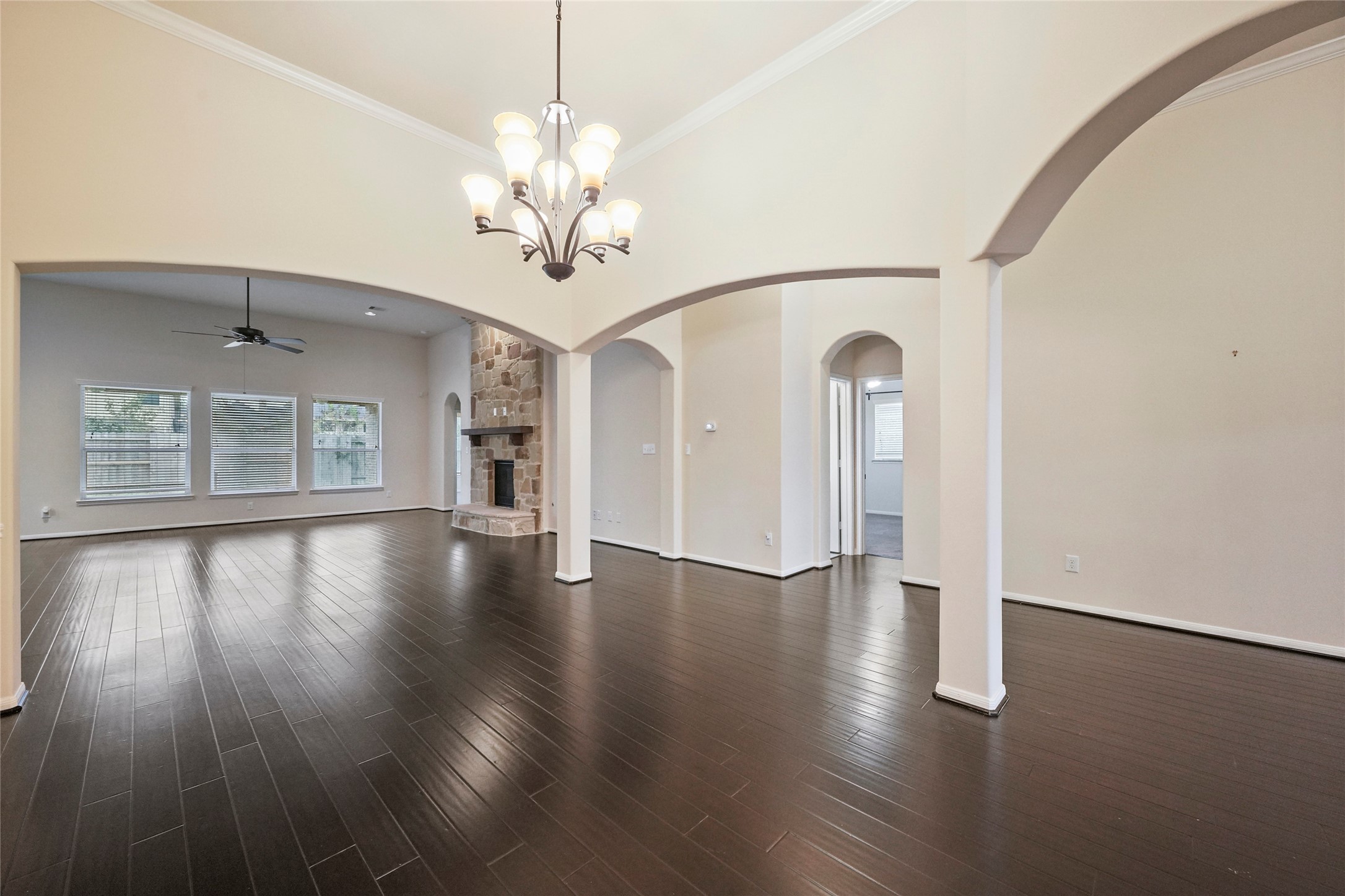 8132 Tranquil Lake Way Conroe, TX 77385 - Photo 3 of 32 Spacious formal dining room with beautiful hardwood floors.