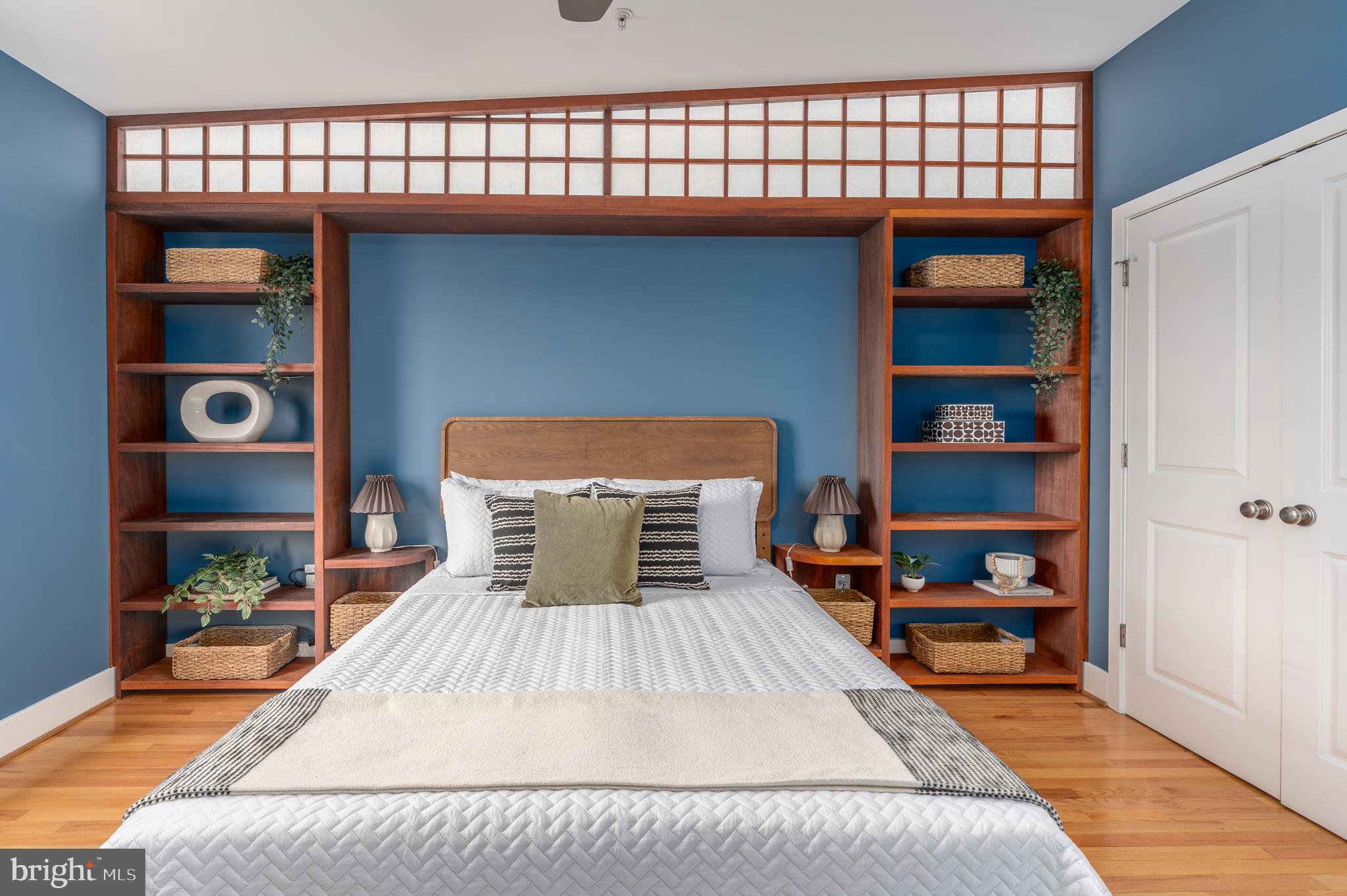 3465 14th Street Northwest, Unit D Washington, DC 20010 - Photo 10 of 24 a room with a bed and a book shelf