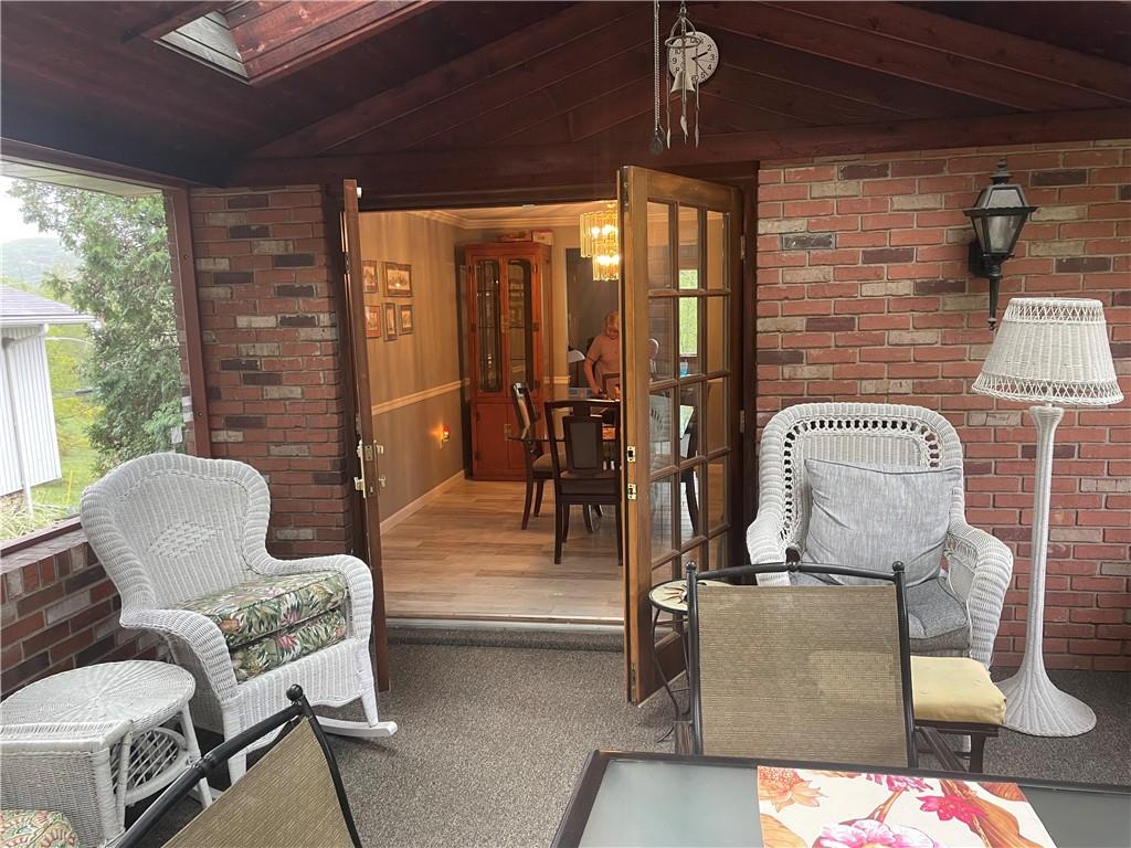 313 Pine Drive New Stanton, PA 15672 - Photo 11 of 41 a living room with furniture and wooden floor