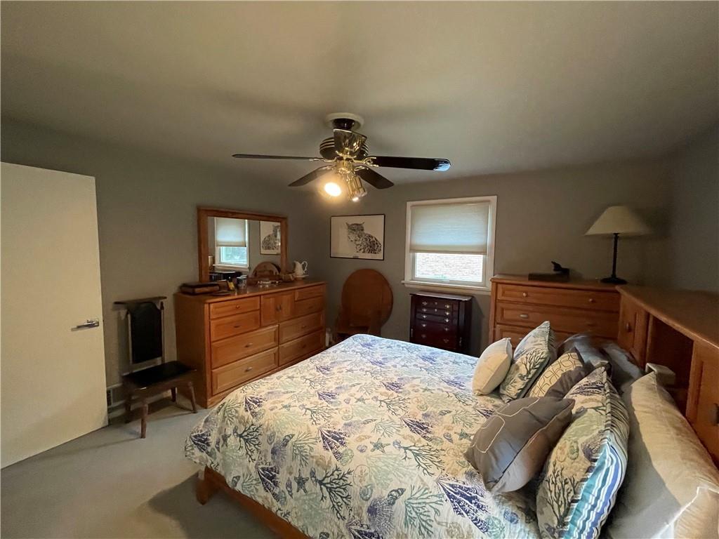 313 Pine Drive New Stanton, PA 15672 - Photo 23 of 41 a bed room with a bed and a television