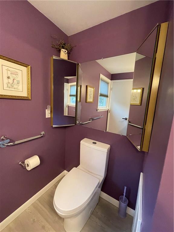 313 Pine Drive New Stanton, PA 15672 - Photo 29 of 41 a bathroom with a toilet a sink and mirror