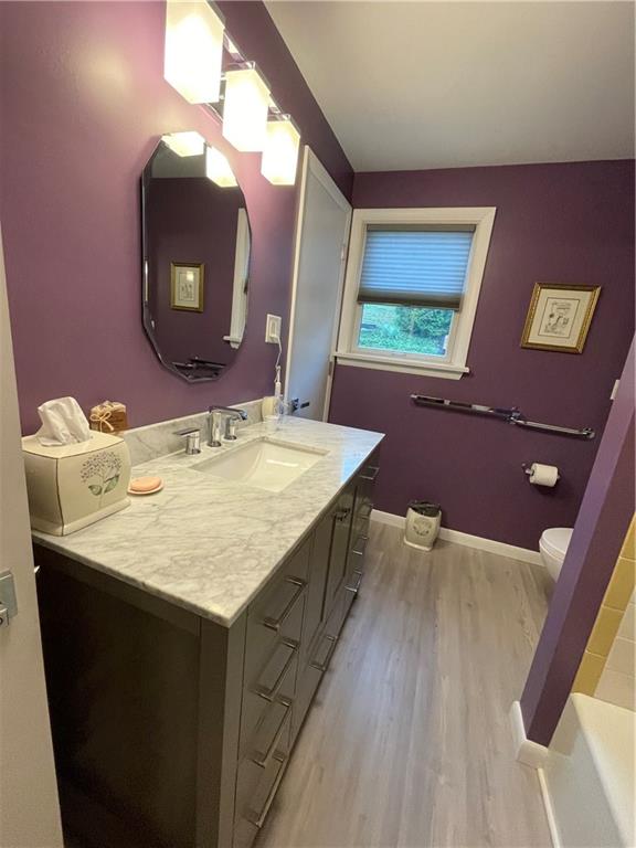 313 Pine Drive New Stanton, PA 15672 - Photo 31 of 41 a bathroom with a sink mirror and vanity