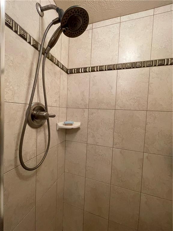 313 Pine Drive New Stanton, PA 15672 - Photo 40 of 41 a bathroom with a shower