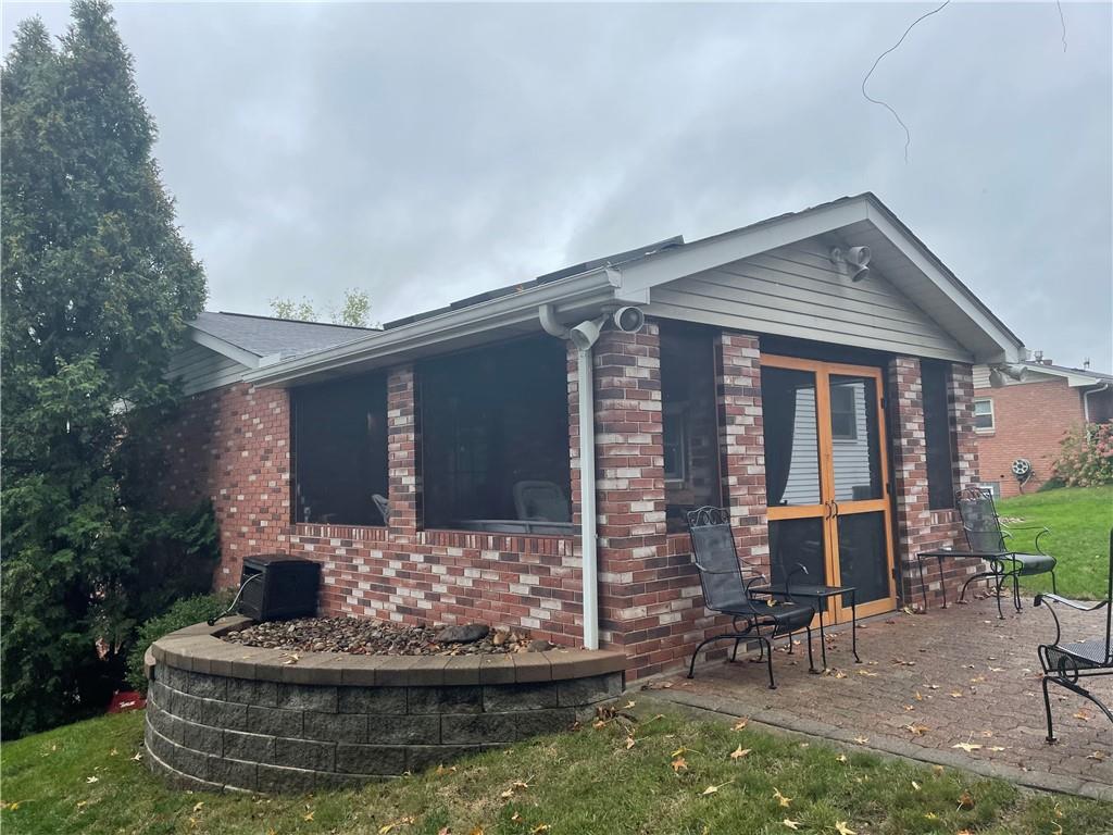 313 Pine Drive New Stanton, PA 15672 - Photo 4 of 41 a front view of a house with entertaining space