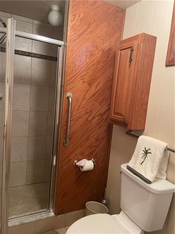 313 Pine Drive New Stanton, PA 15672 - Photo 41 of 41 a bathroom with a toilet and shower