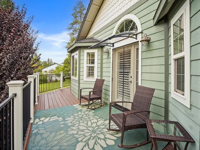 a view of a chair and table in the balcony