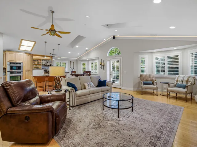 a living room with furniture or couch and a window