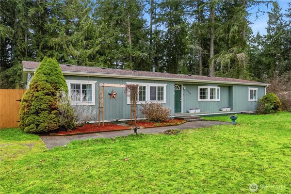front view of a house with a yard