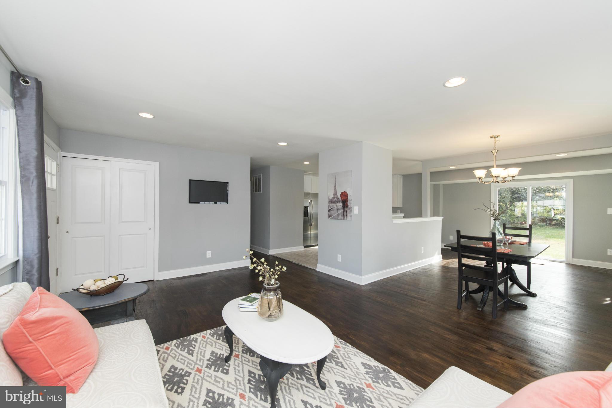 6705 Fordcrest Road Baltimore, MD 21237 - Photo 11 of 30 a living room with furniture and wooden floor