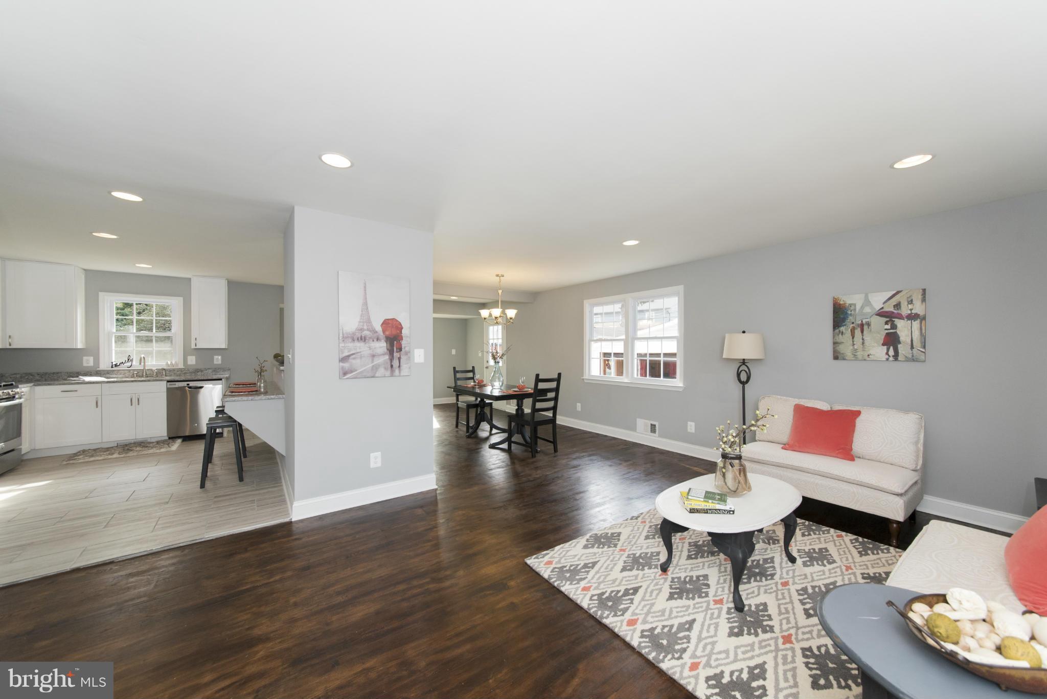 6705 Fordcrest Road Baltimore, MD 21237 - Photo 12 of 30 a living room with furniture and wooden floor