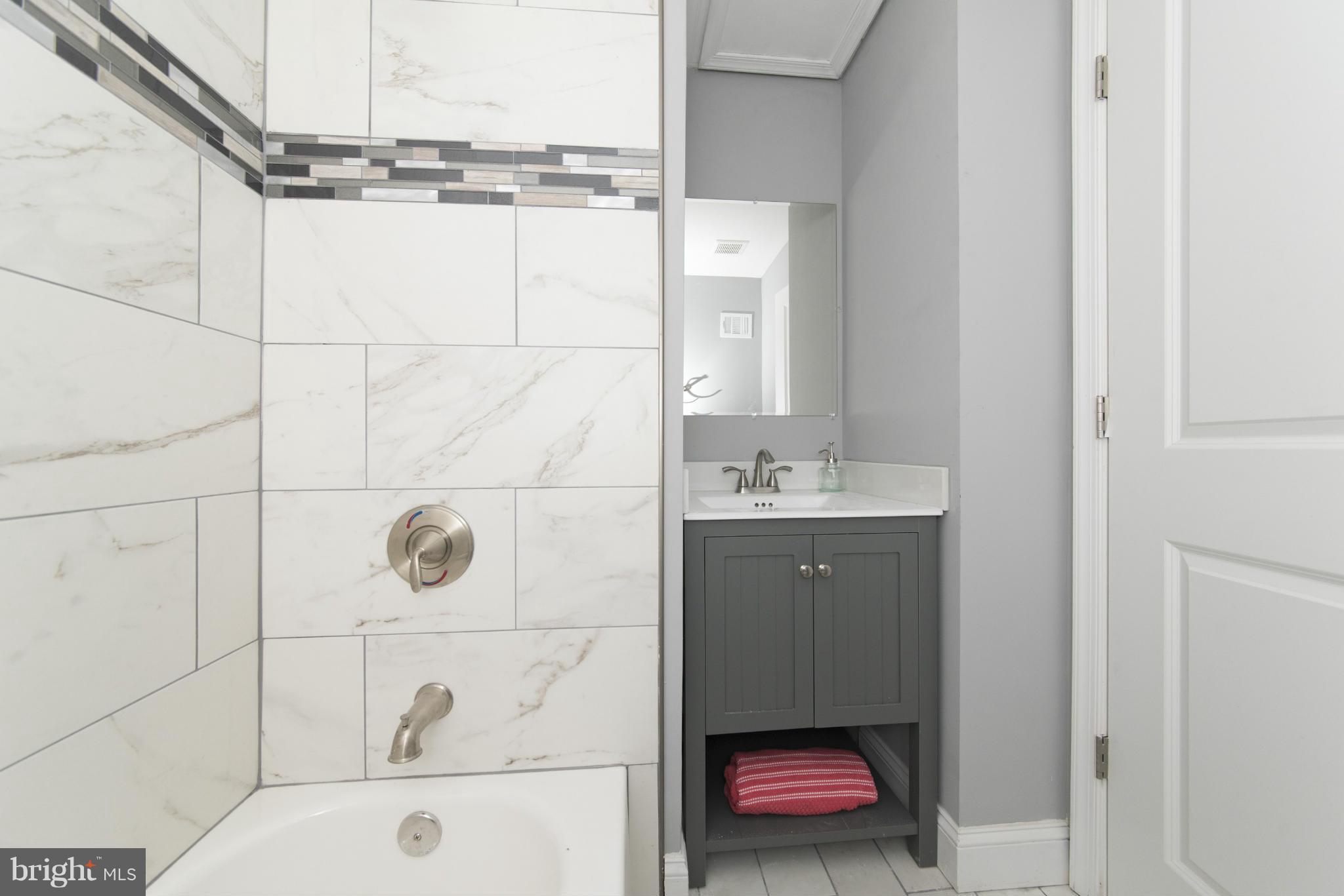 6705 Fordcrest Road Baltimore, MD 21237 - Photo 18 of 30 a bathroom with a shower