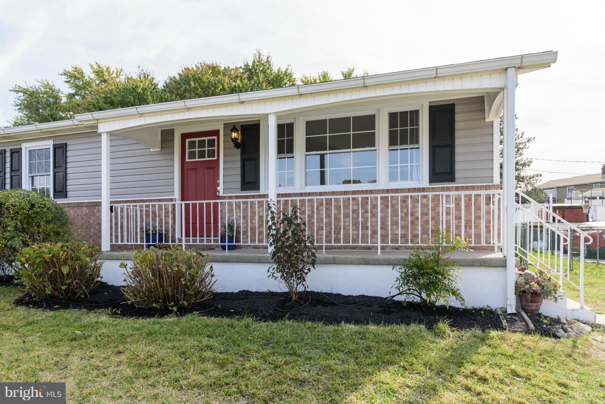 6705 Fordcrest Road Baltimore, MD 21237 - Photo 28 of 30 a front view of a house with a yard