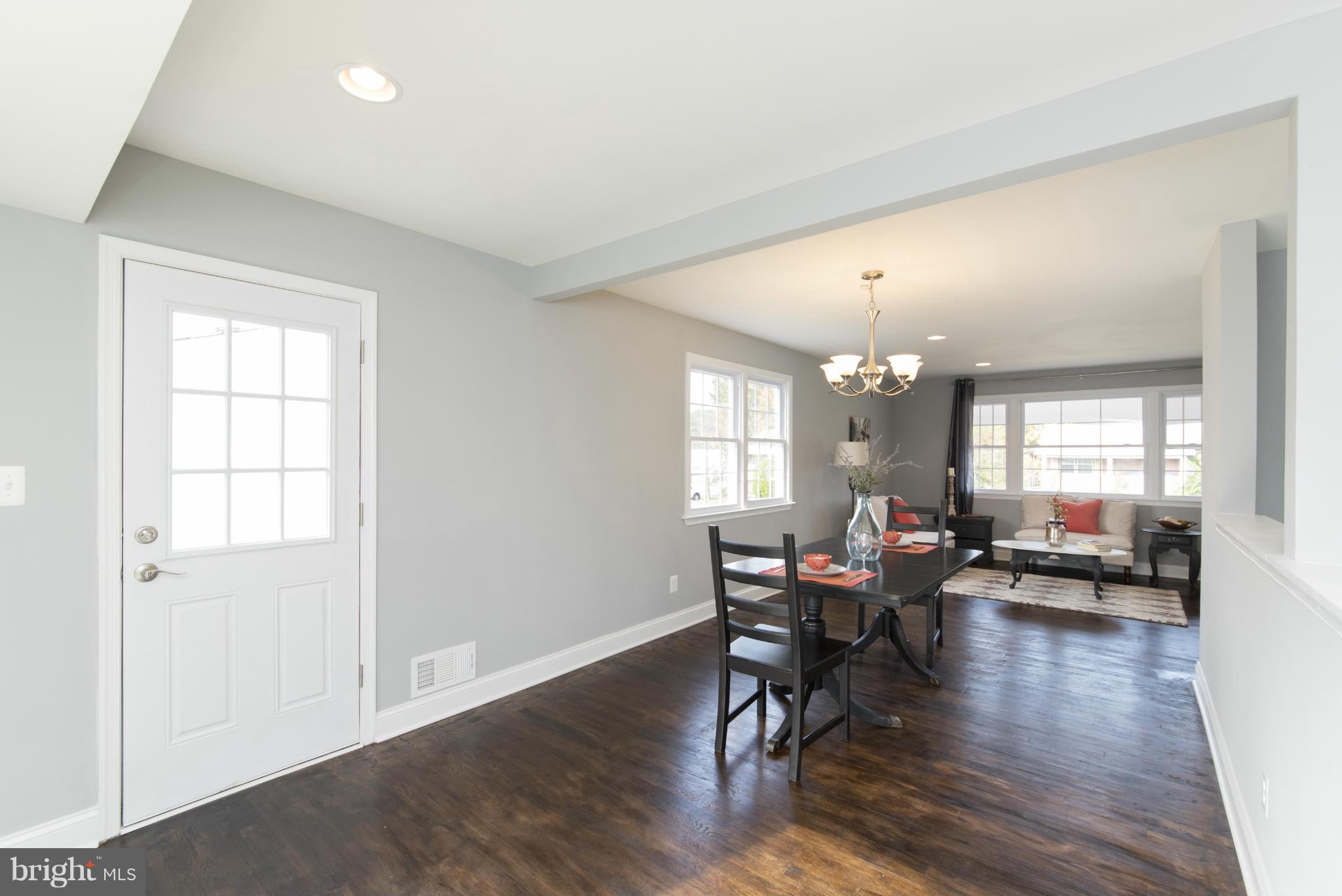 6705 Fordcrest Road Baltimore, MD 21237 - Photo 8 of 30 a living room with furniture and wooden floor